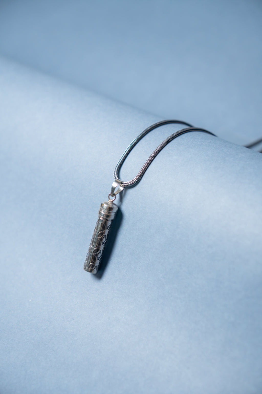 HIDDEN CAPSULE PENDANT