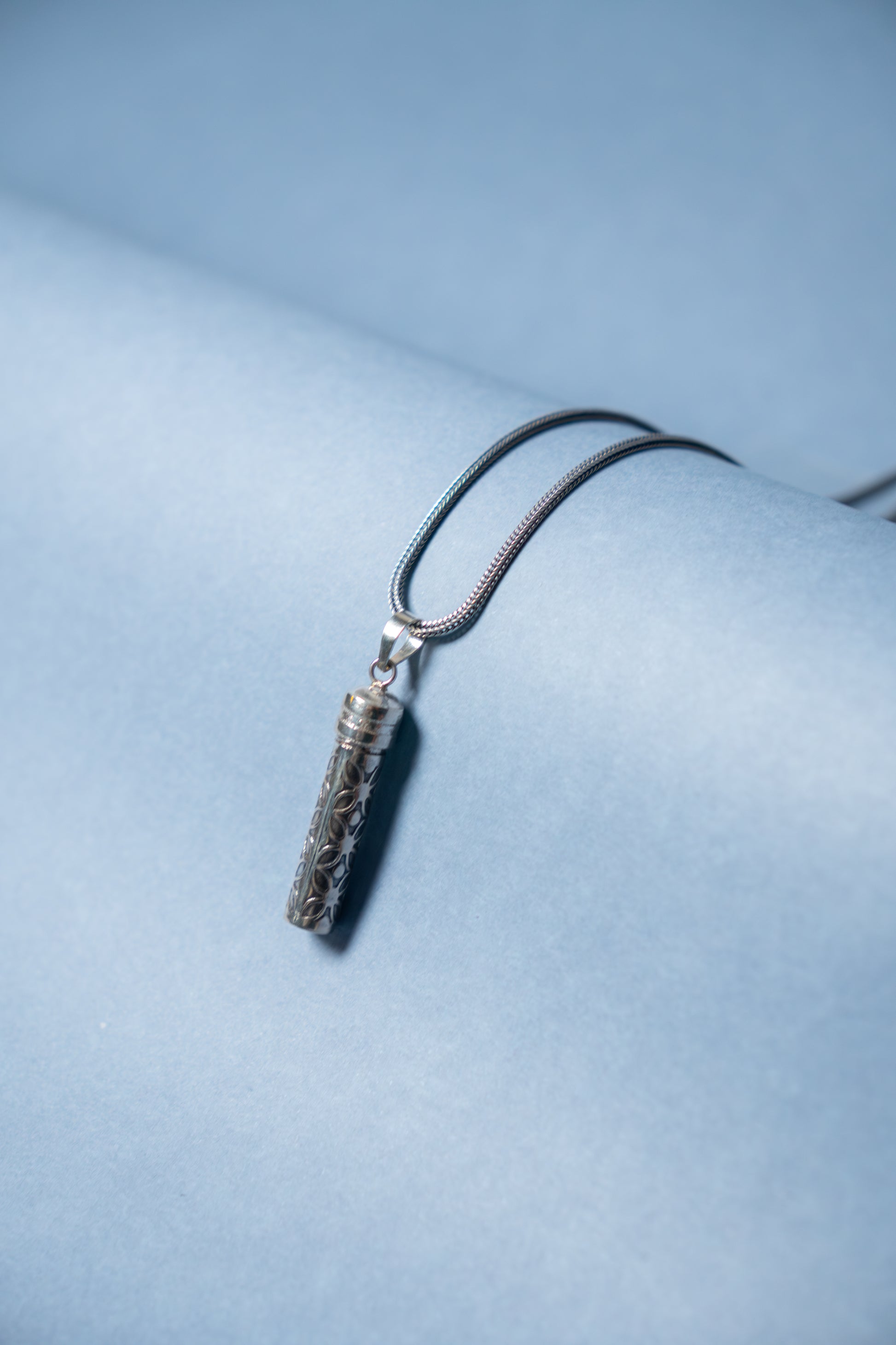 HIDDEN CAPSULE PENDANT